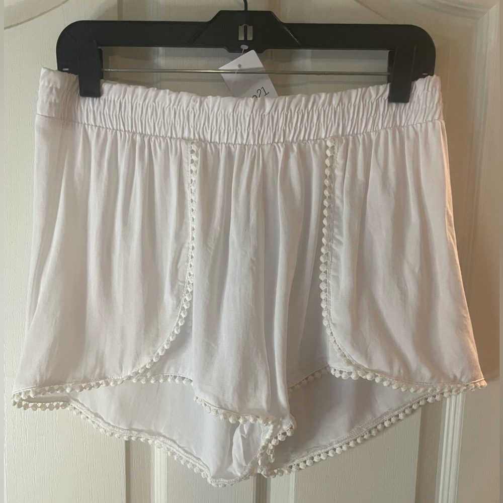 NEW WITH TAGS!! Sheer white high wasted shorts!